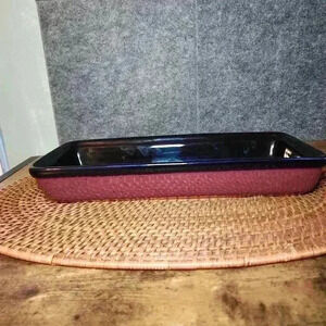 Stoneware Casserole Dish 13.5" x 6" dark blue and mauve on the bottom.